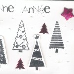 Thumbnail image for Modèle de carte de voeux avec décor sapins noirs